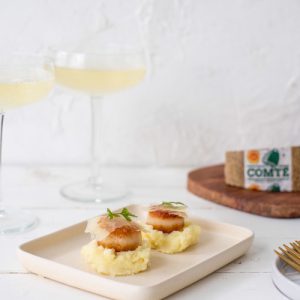 Vieiras sobre puré de patatas con queso Comté